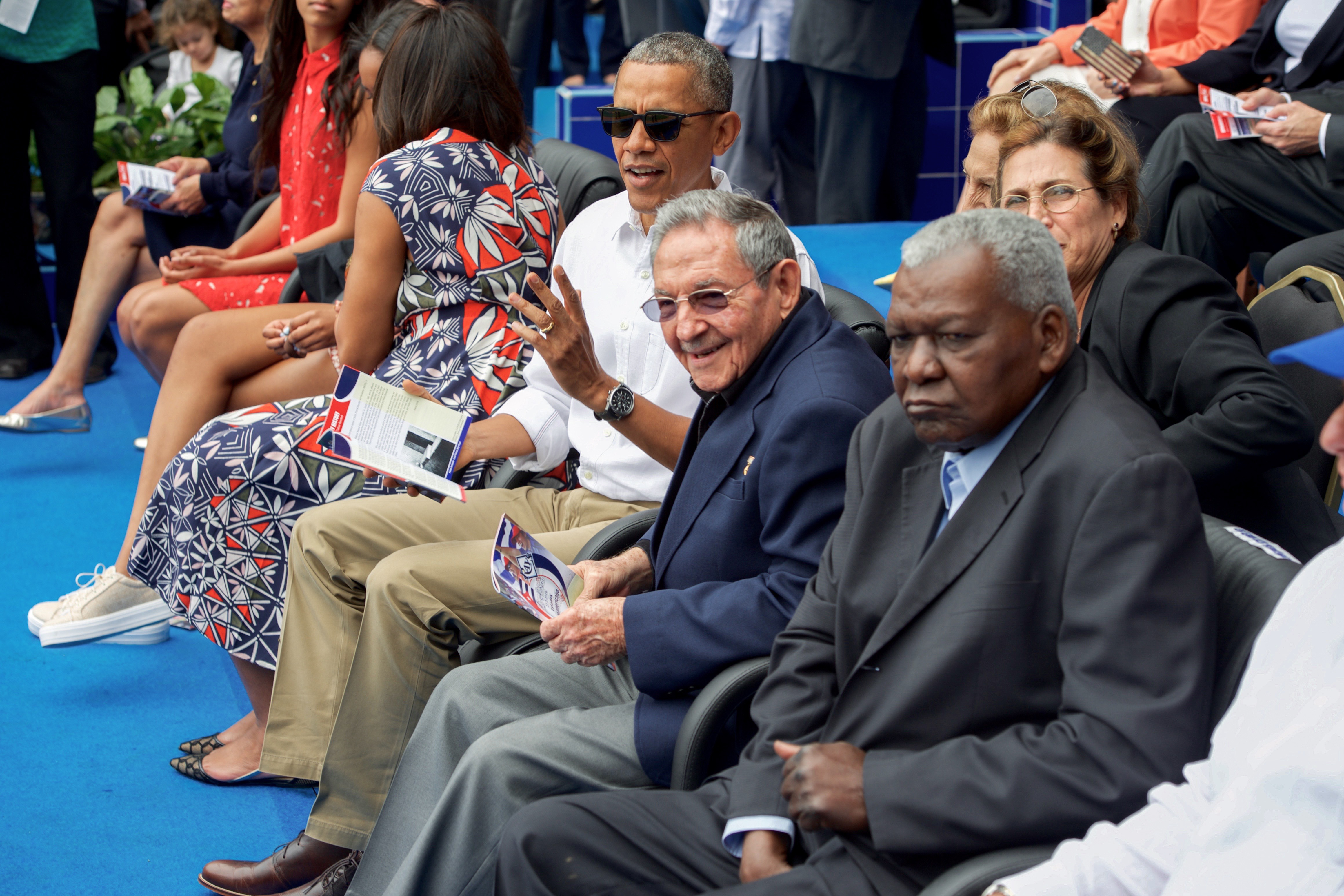 President Obama With Cuban President Castro at Estadio Latinoamericano in Havana, Cuba U.S. President Barack Obama sits with Cuban President Raul Castro at the Estadio Latinoamericano in Havana, Cuba, as he members of a U.S. delegation including U.S. Secretary of State John Kerry attend an exhibition game on March 22, 2016, between the Cuban National Baseball Team and the Tampa Bay Rays. [State Department photo/ Public Domain]
